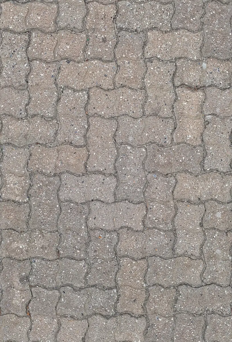 Grey wavy pavers laid in a running bond with tight joints